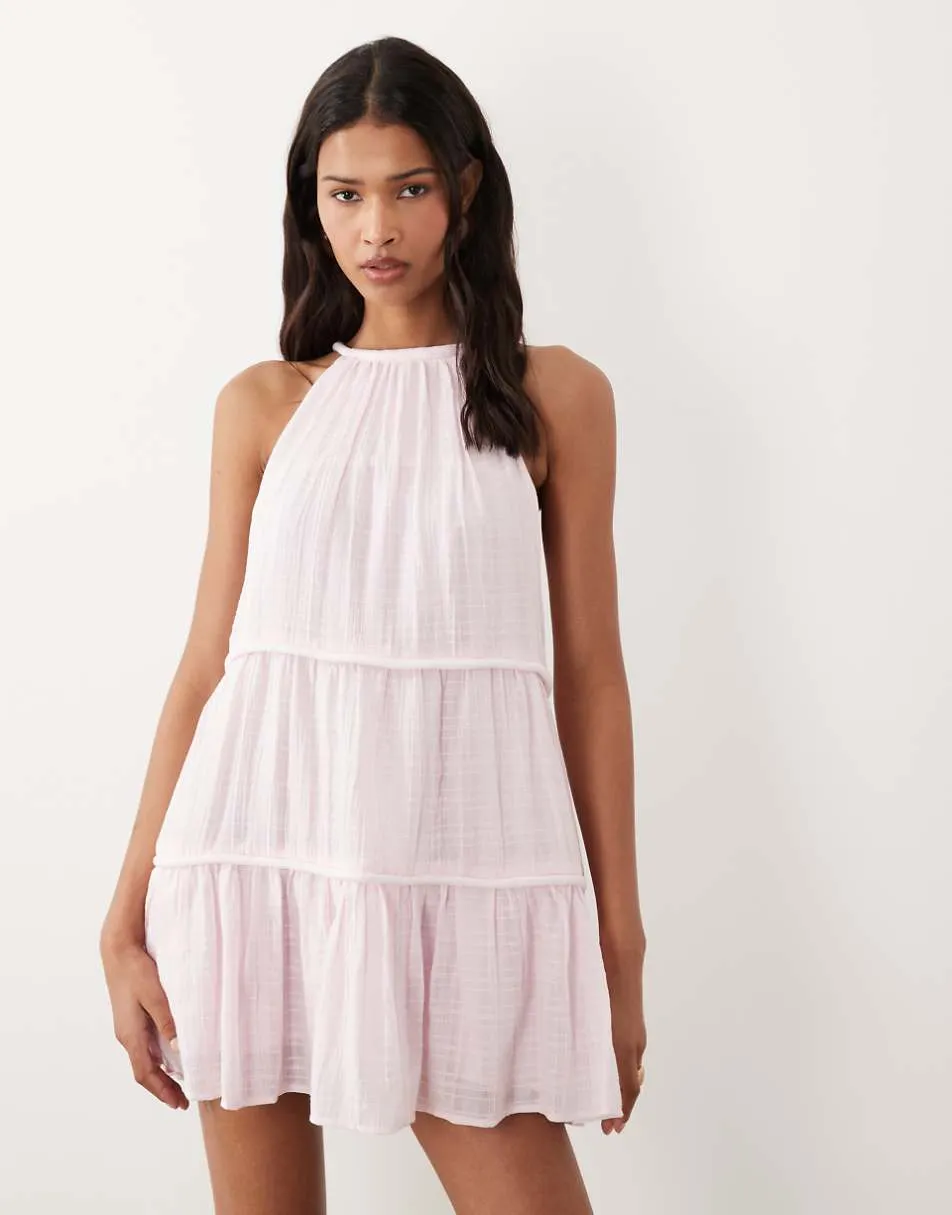 ASOS DESIGN halter neck tiered mini sundress with chunky binding in sugary pink