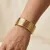 Armband in goudkleurig edelstaal, geribbeld