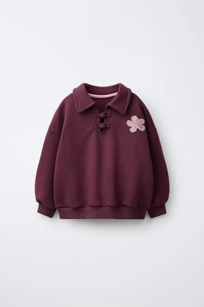 POLO SWEATSHIRT WITH FROG FASTENING AND EMBROIDERY