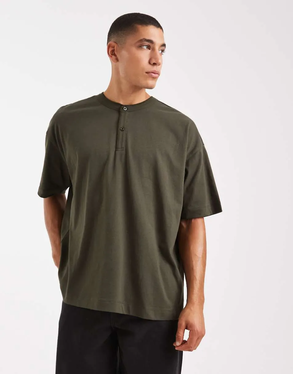 ASOS DESIGN oversized henley t-shirt with half sleeve in green