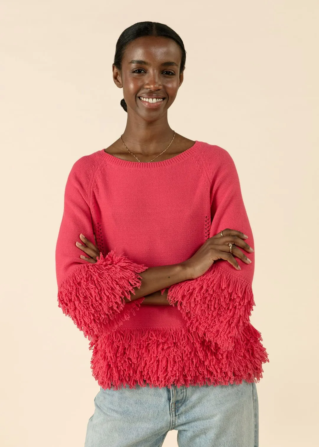 Stickad tröja med fransar