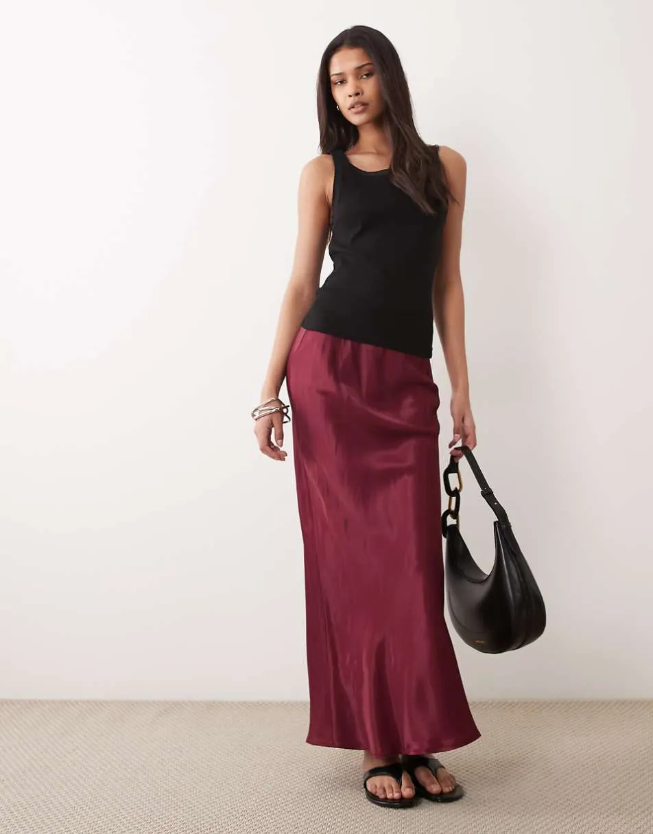 ASOS DESIGN satin bias maxi skirt in burgundy