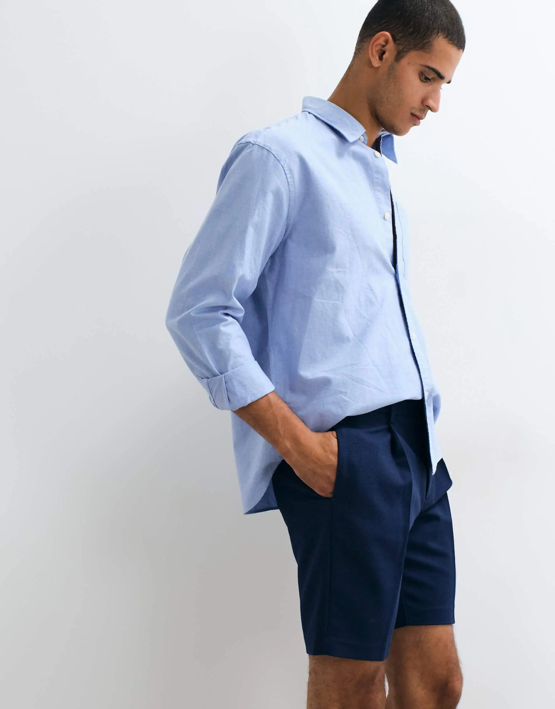 ASOS DESIGN tailored slim pleated shorts in navy microtexture