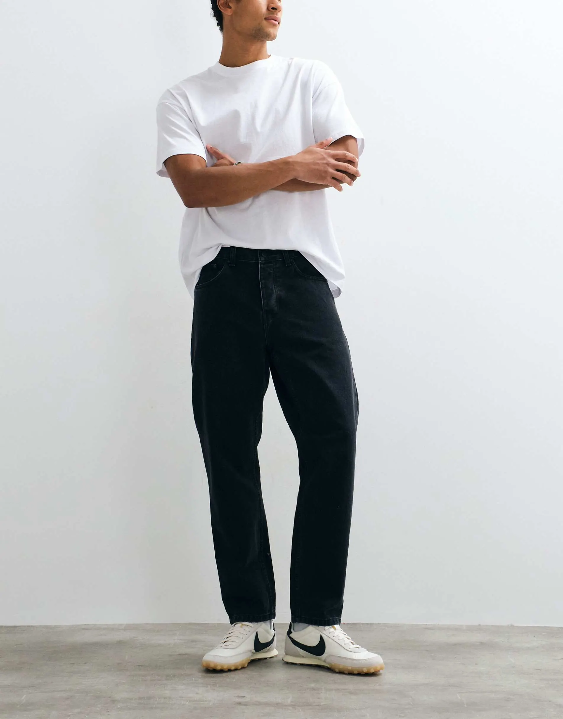 Carhartt WIP Newel relaxed tapered fit jeans in black wash