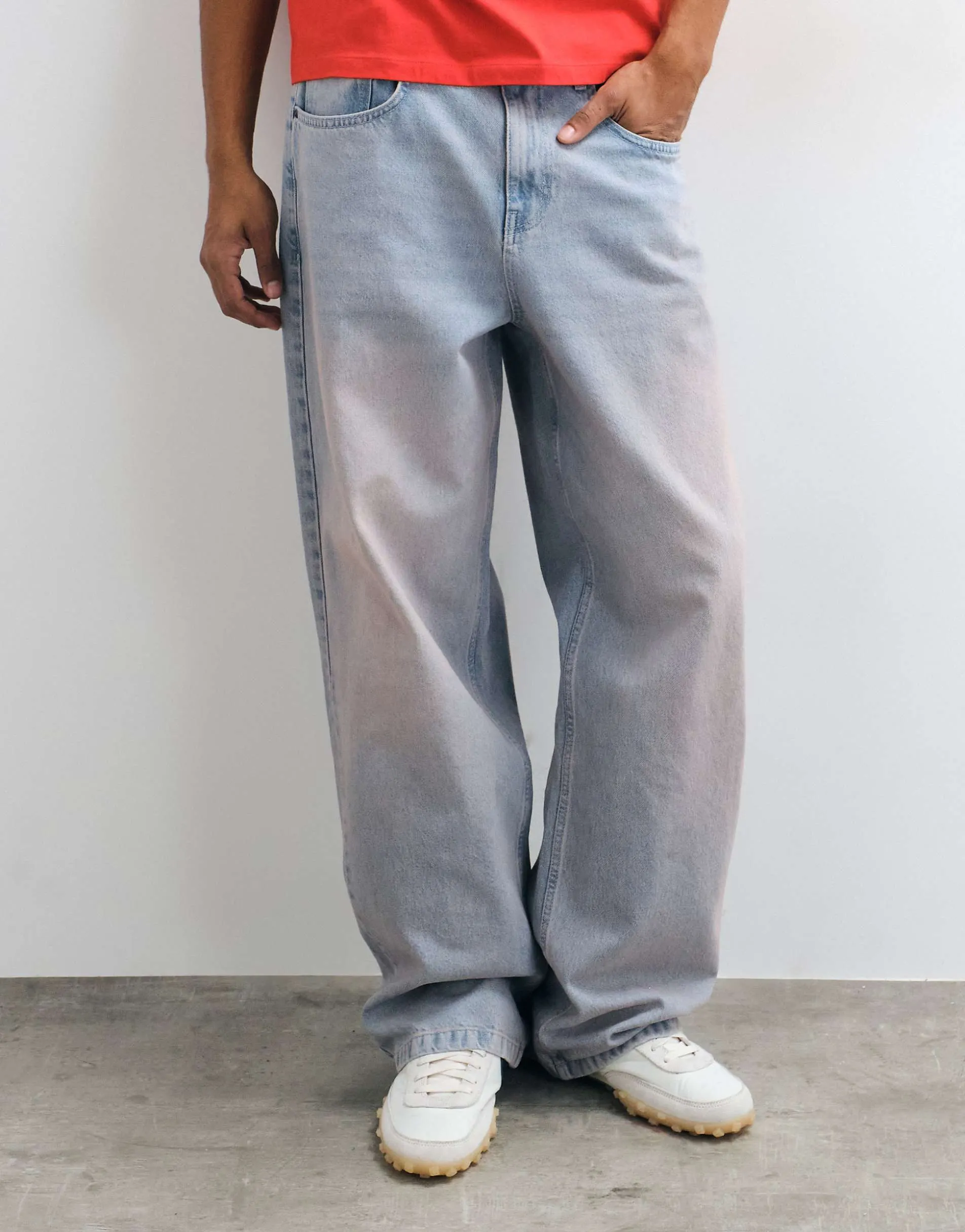 ASOS DESIGN baggy jeans in light wash blue with pink tint