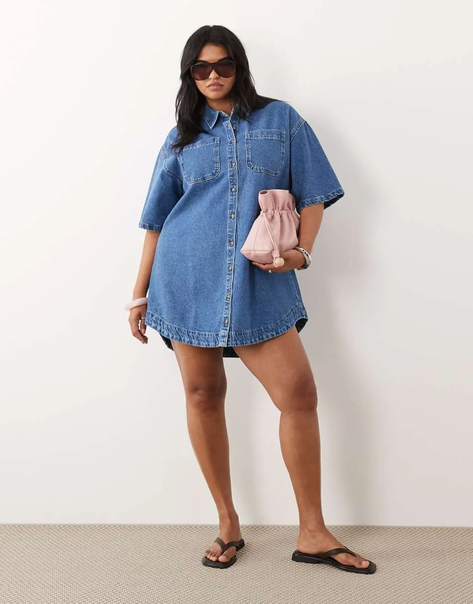 ASOS DESIGN Curve denim boxy shirt dress with pocket detail in mid blue
