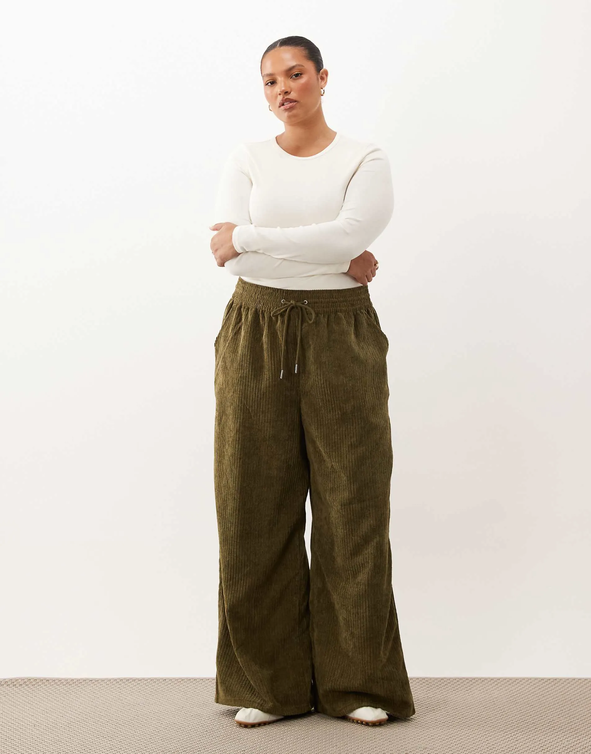 ASOS DESIGN Curve pull on waist wide leg cord trousers in dark khaki