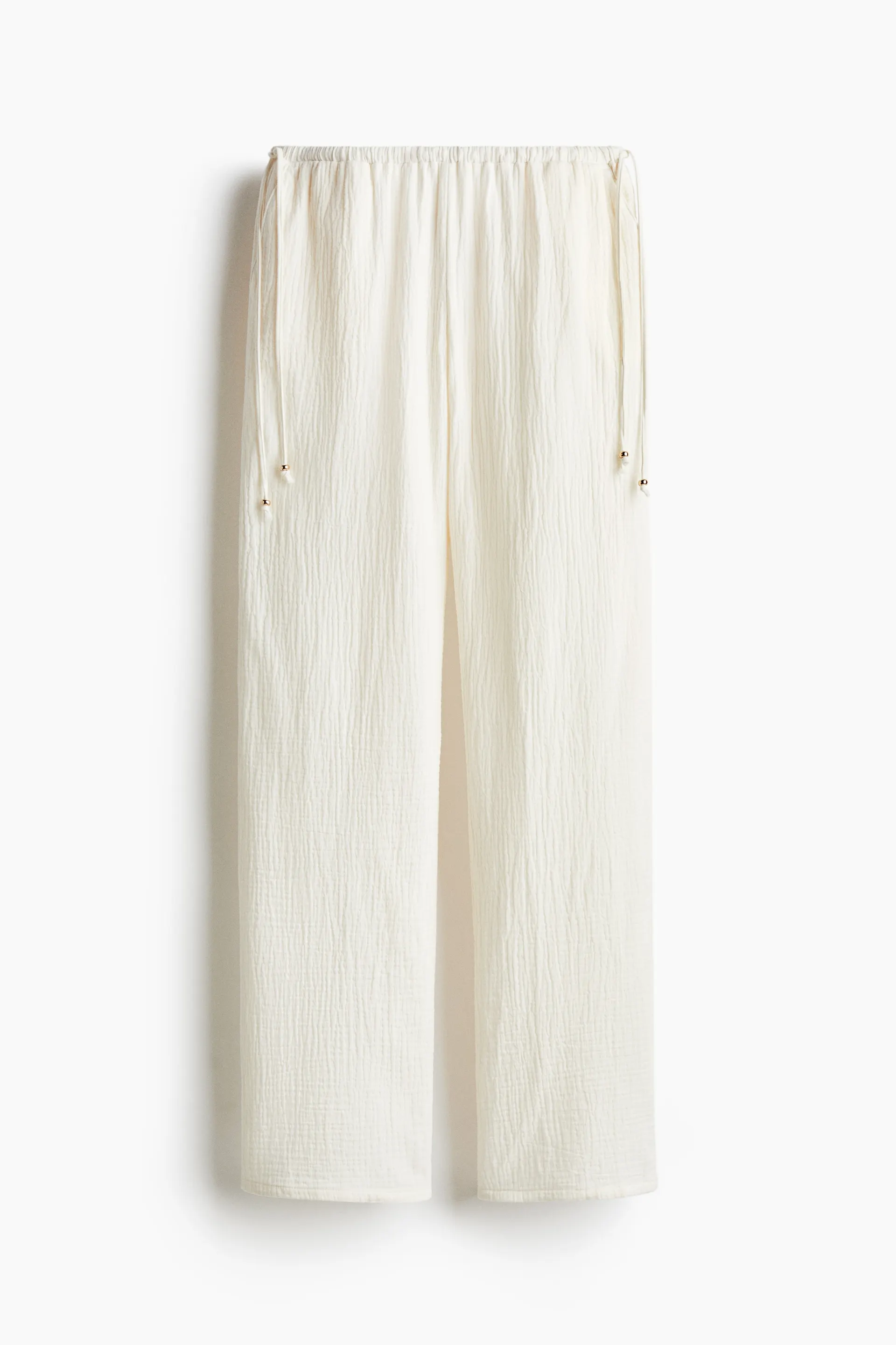 Pantalón ancho con cordón de ajuste