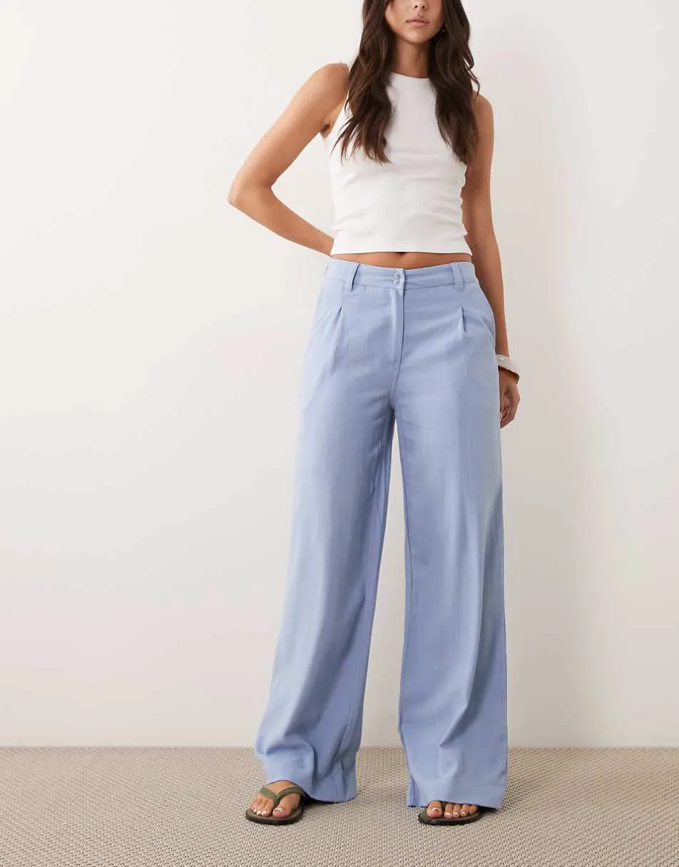 ASOS DESIGN wide leg trousers with pleat detail in linen blend in blue