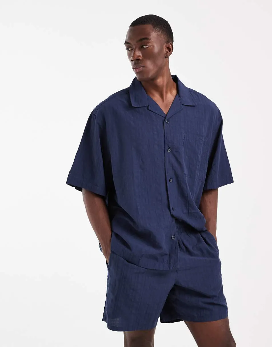 ASOS DESIGN co-ord seersucker shorts in mid length in navy