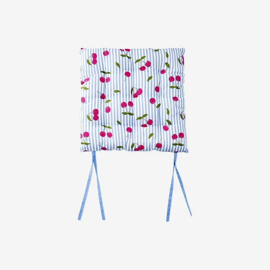 Cushion with stripes and cherries