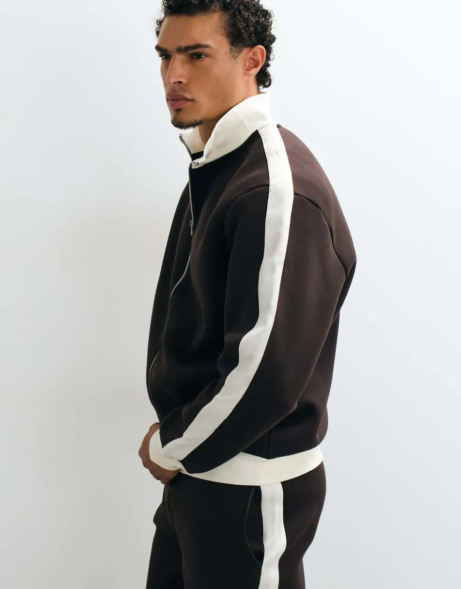 ASOS DESIGN relaxed zip through track jacket in scuba-style fabric with pique panels in brown