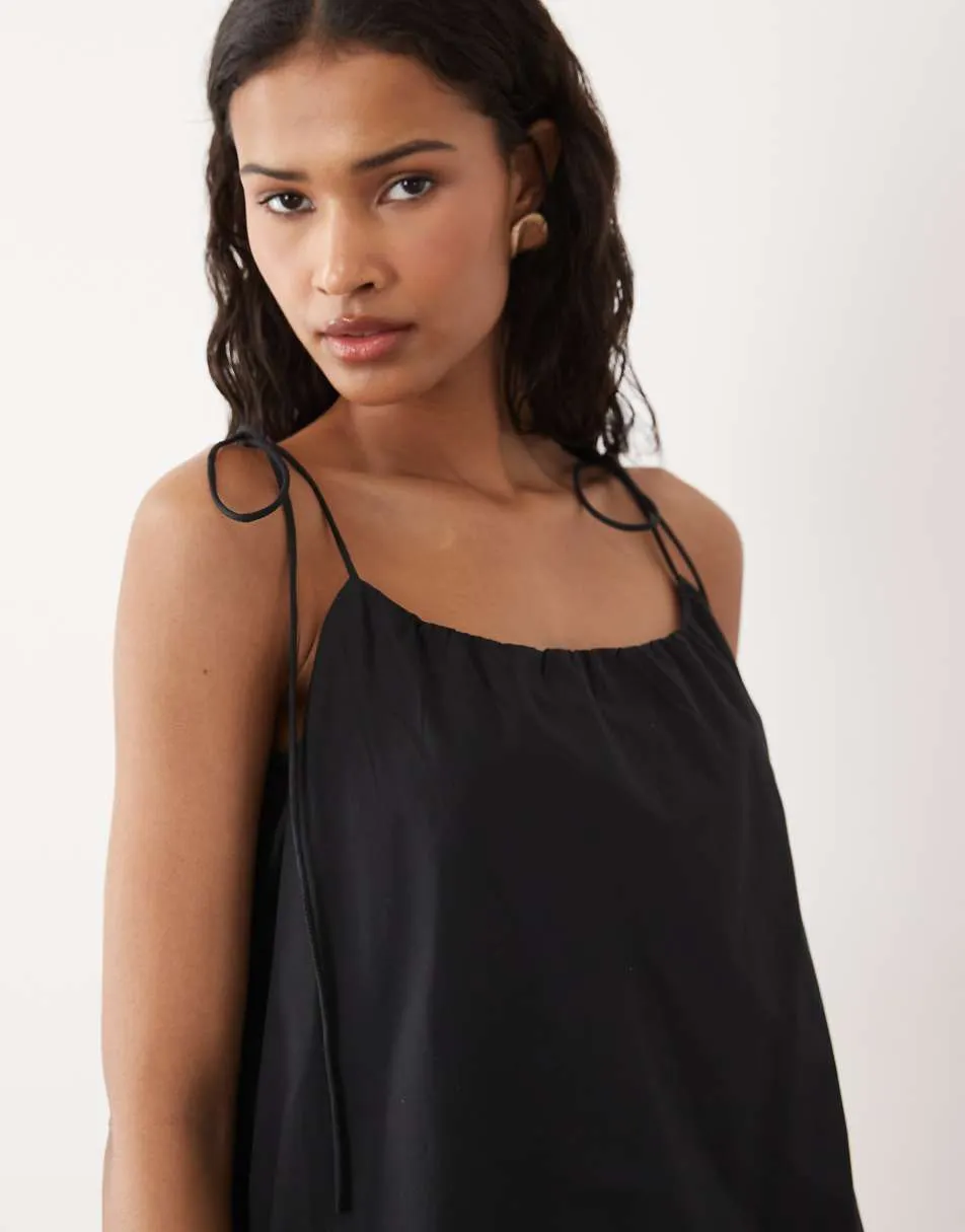 ASOS DESIGN poplin puff mini sundress with tie straps in black