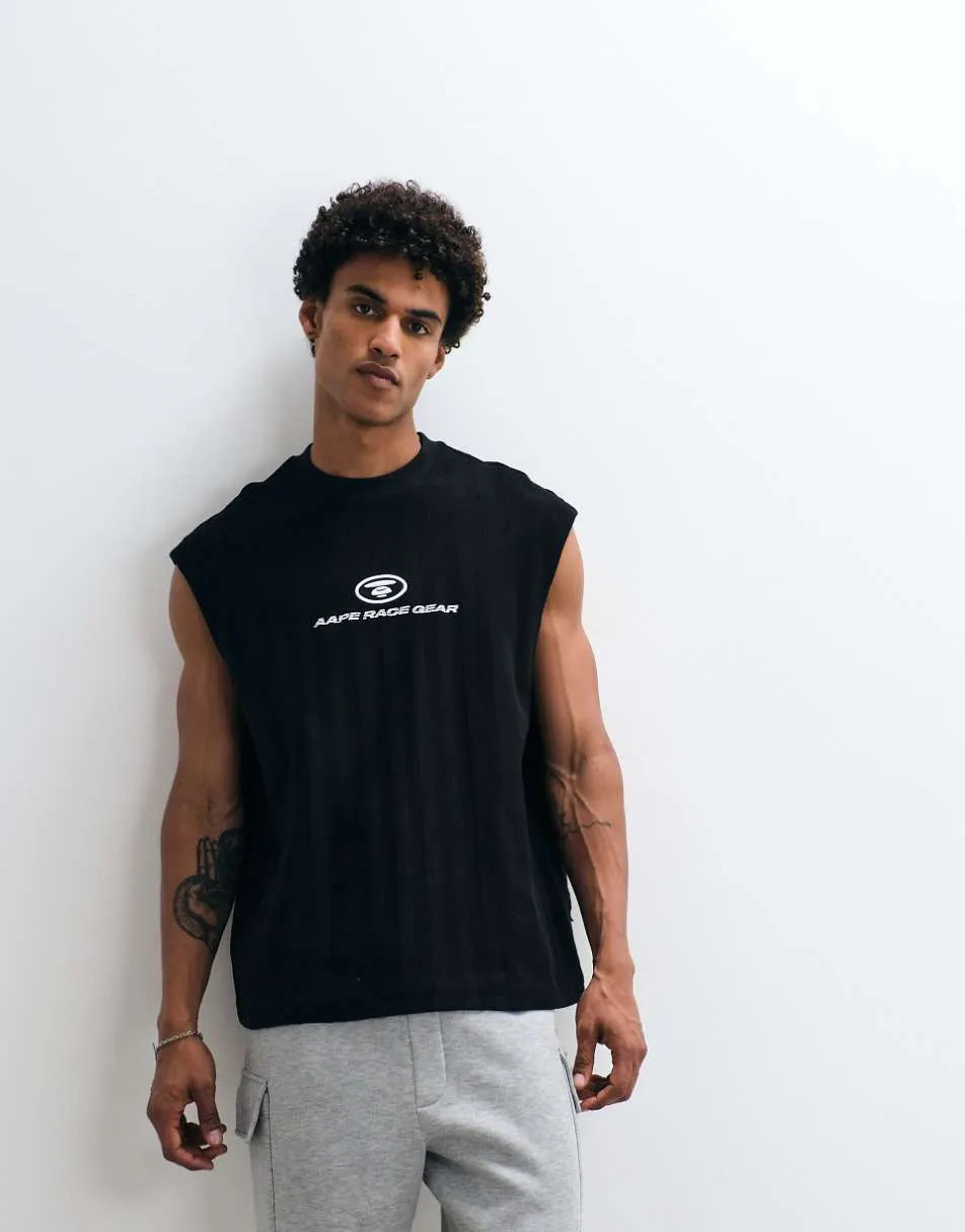 Aape by A Bathing Ape loose fit sleeveless vest in washed black with placement logo insert