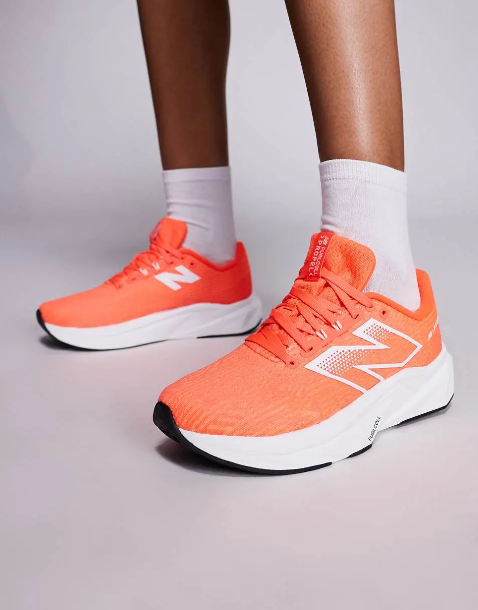 New Balance Propel running trainers in bright red