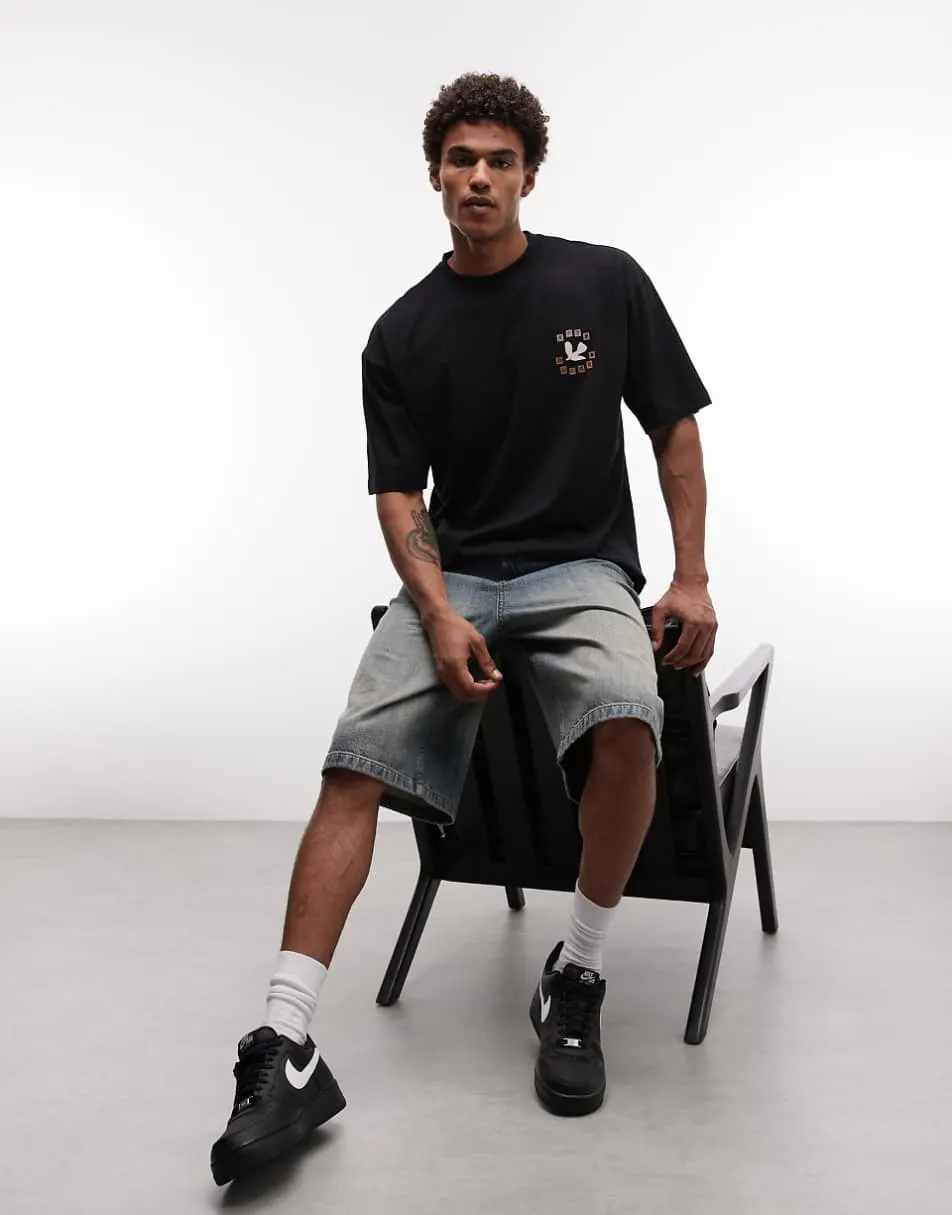 ASOS DESIGN oversized t-shirt with bird graphic in black