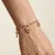 Armband in edelstaal, hartje en kruis