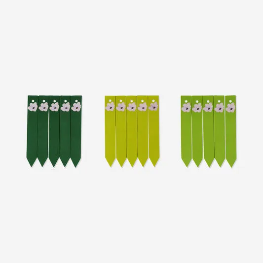 Wooden plant labels with flowers ...