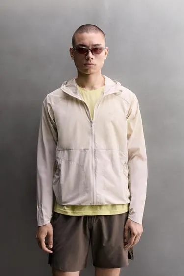 TECHNICAL WINDBREAKER JACKET