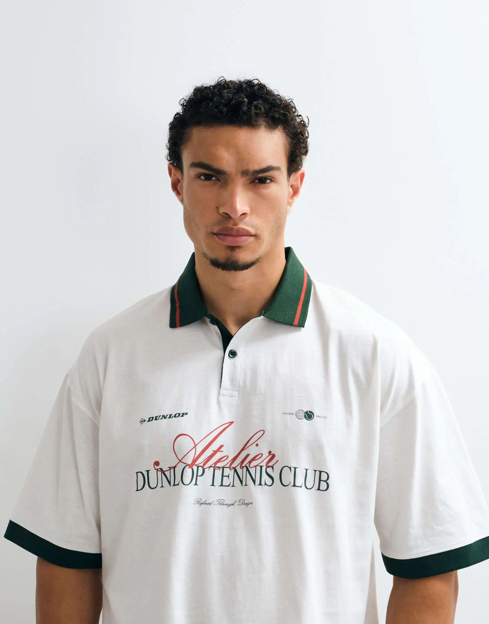 ASOS DESIGN oversized polo with Dunlop Tennis in Off white