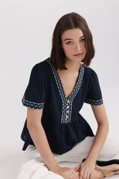 Camisa peplum detalles escote
