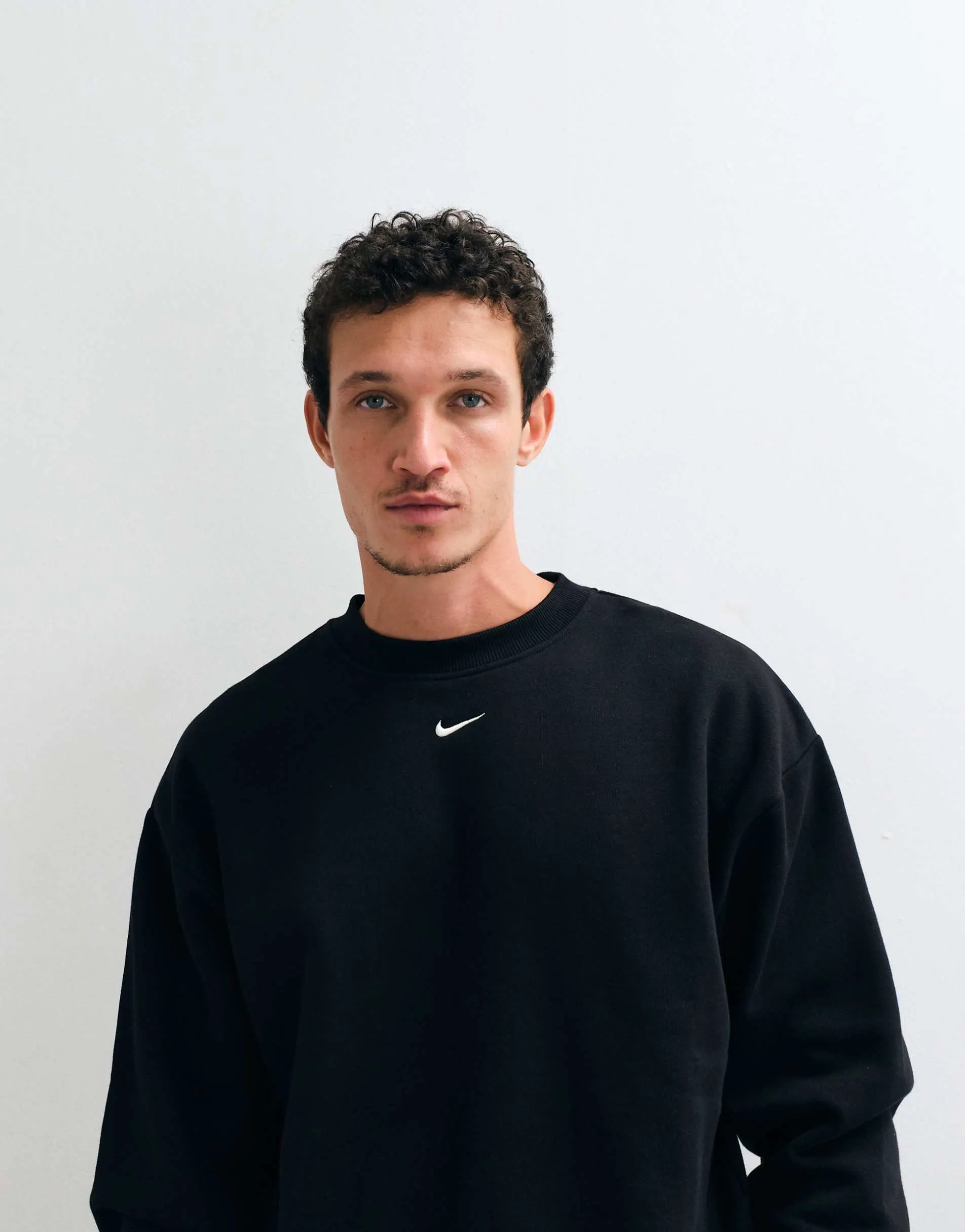 Nike Solo central swoosh logo oversized fleece sweatshirt in black