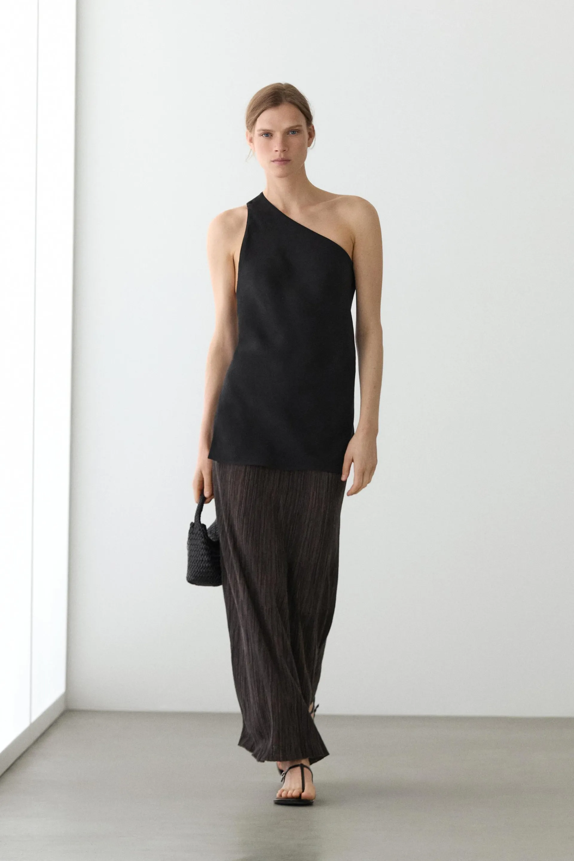 Plisovaná midi sukně s celoplošným proužkovaným vzorem