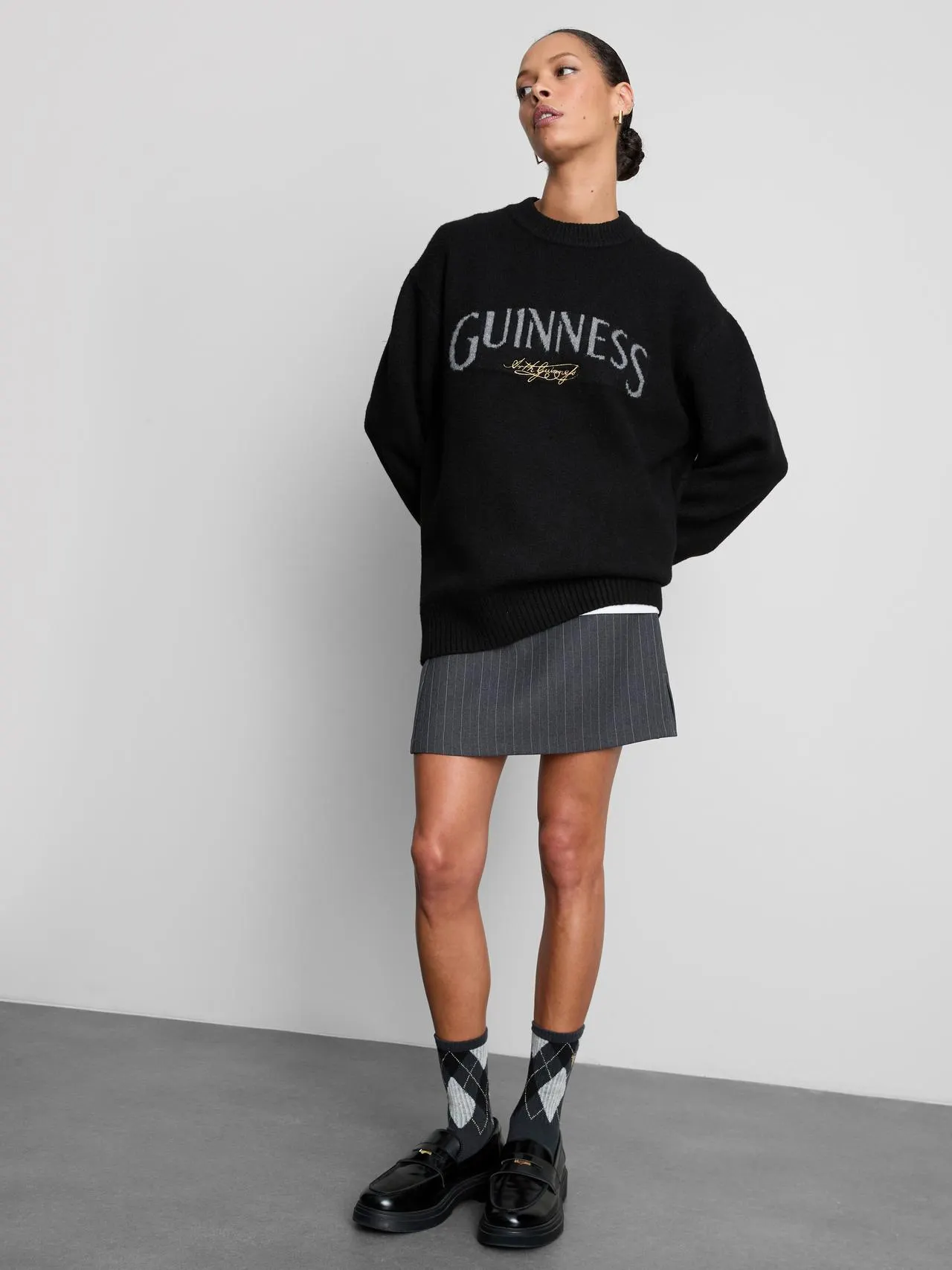 Pull Guinness à logo tricoté
