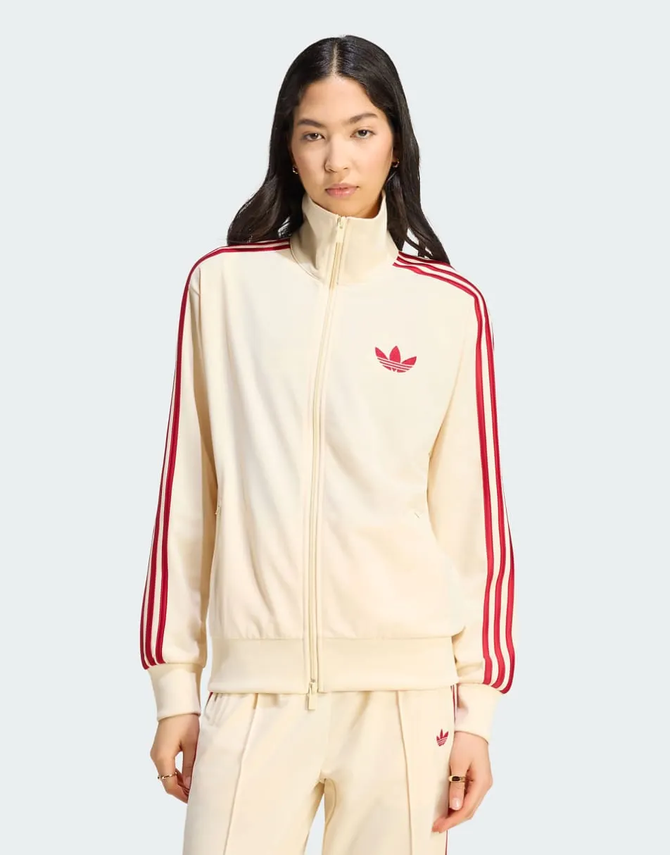 adidas Originals Firebird track top loose in warm vanilla / team victory
