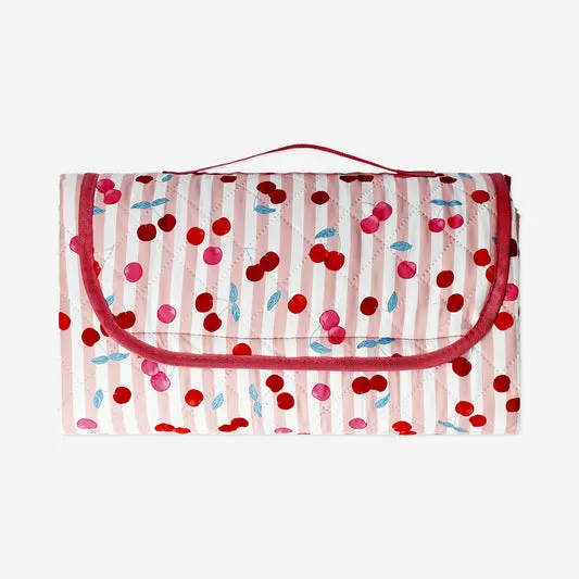 Quilted picnic blanket with berry...