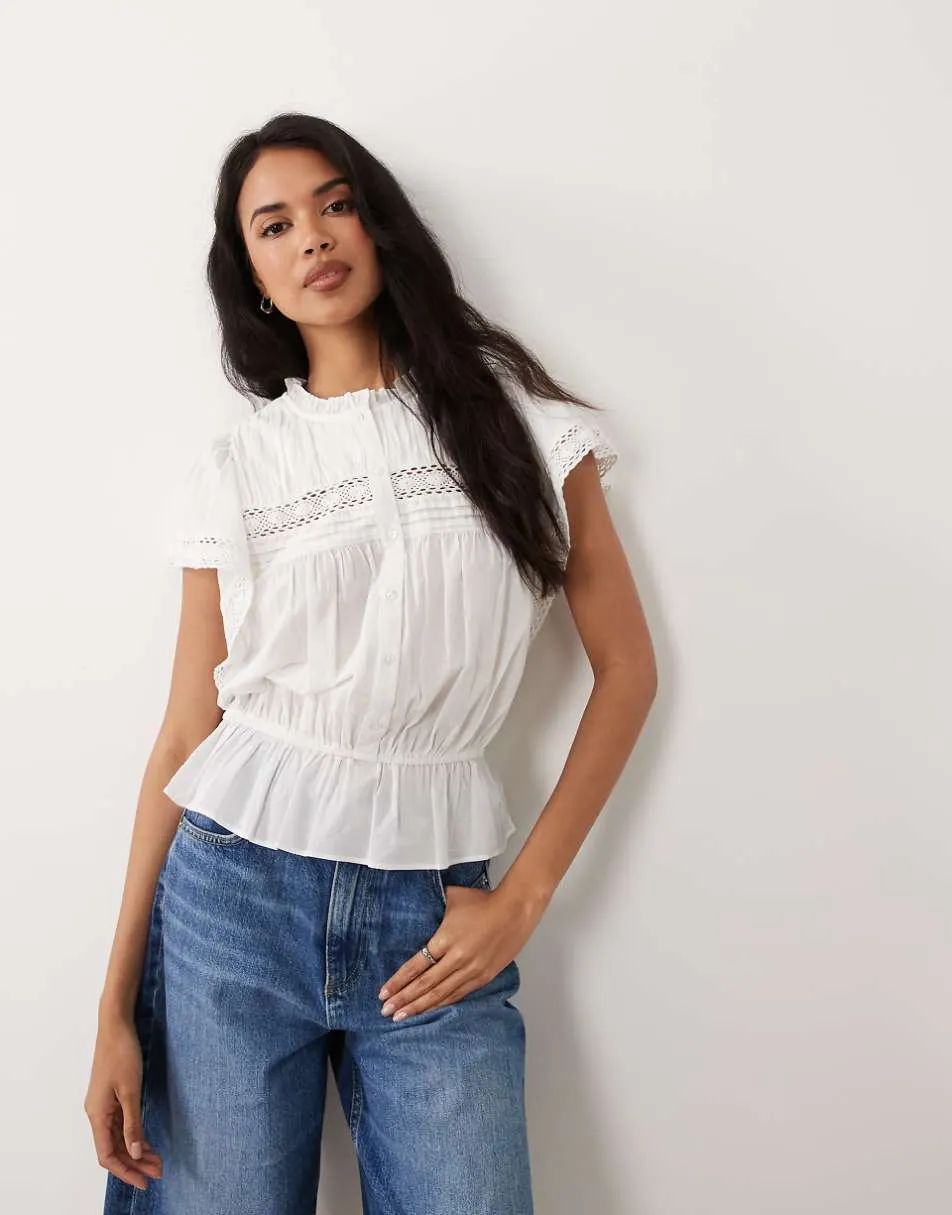 Gina Tricot pure cotton broderie sleeveless blouse in white