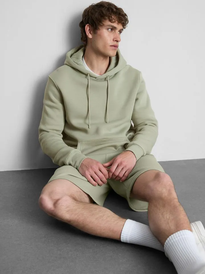 Sweat à capuche à cordon de serrage