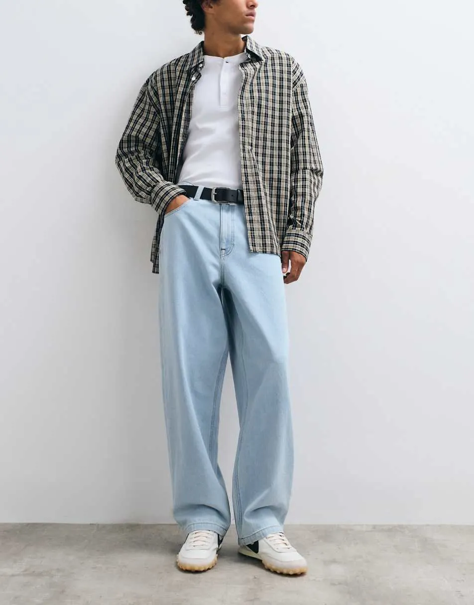 ASOS DESIGN loose jeans in light wash blue