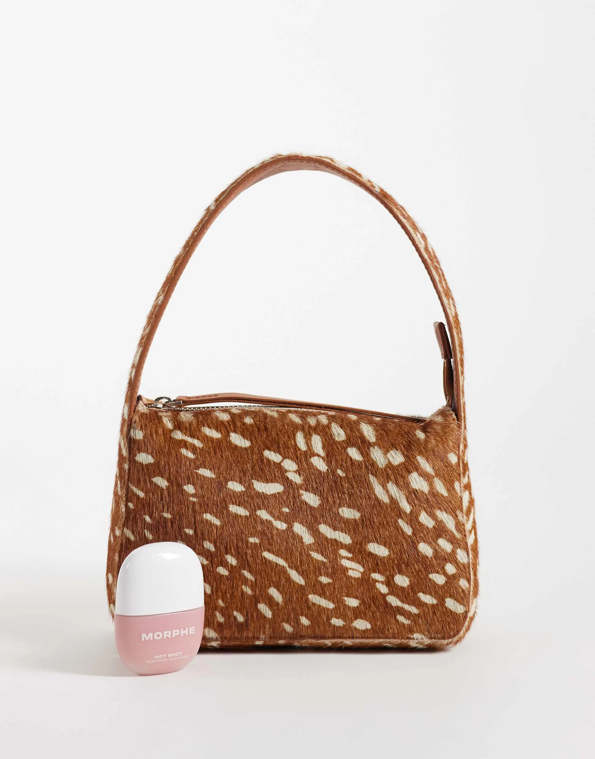 ASOS DESIGN hair on leather grab bag in deer print