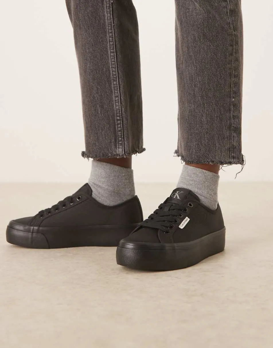 Calvin Klein flatform lace up trainers in black
