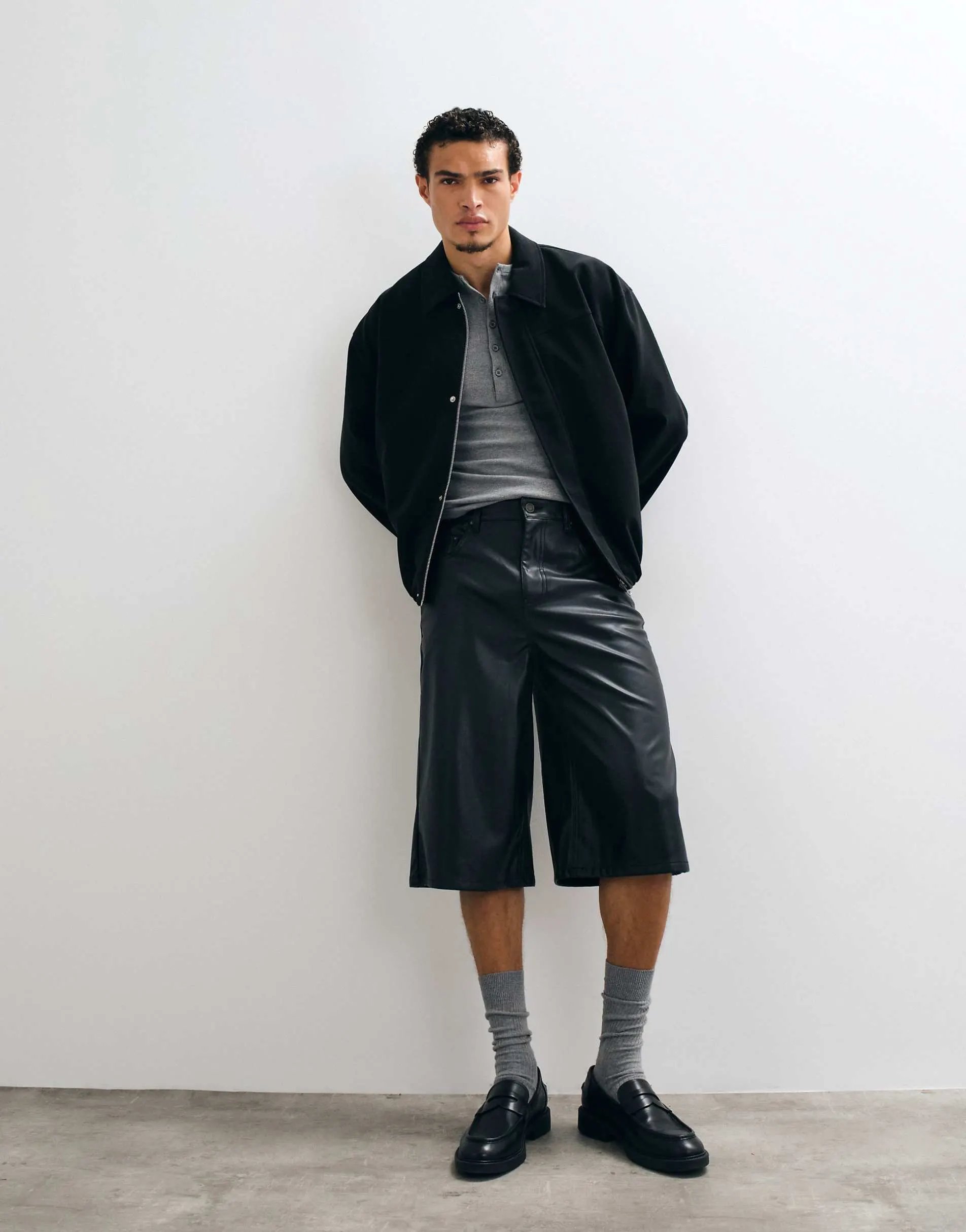 ASOS DESIGN longer length jorts in black faux leather