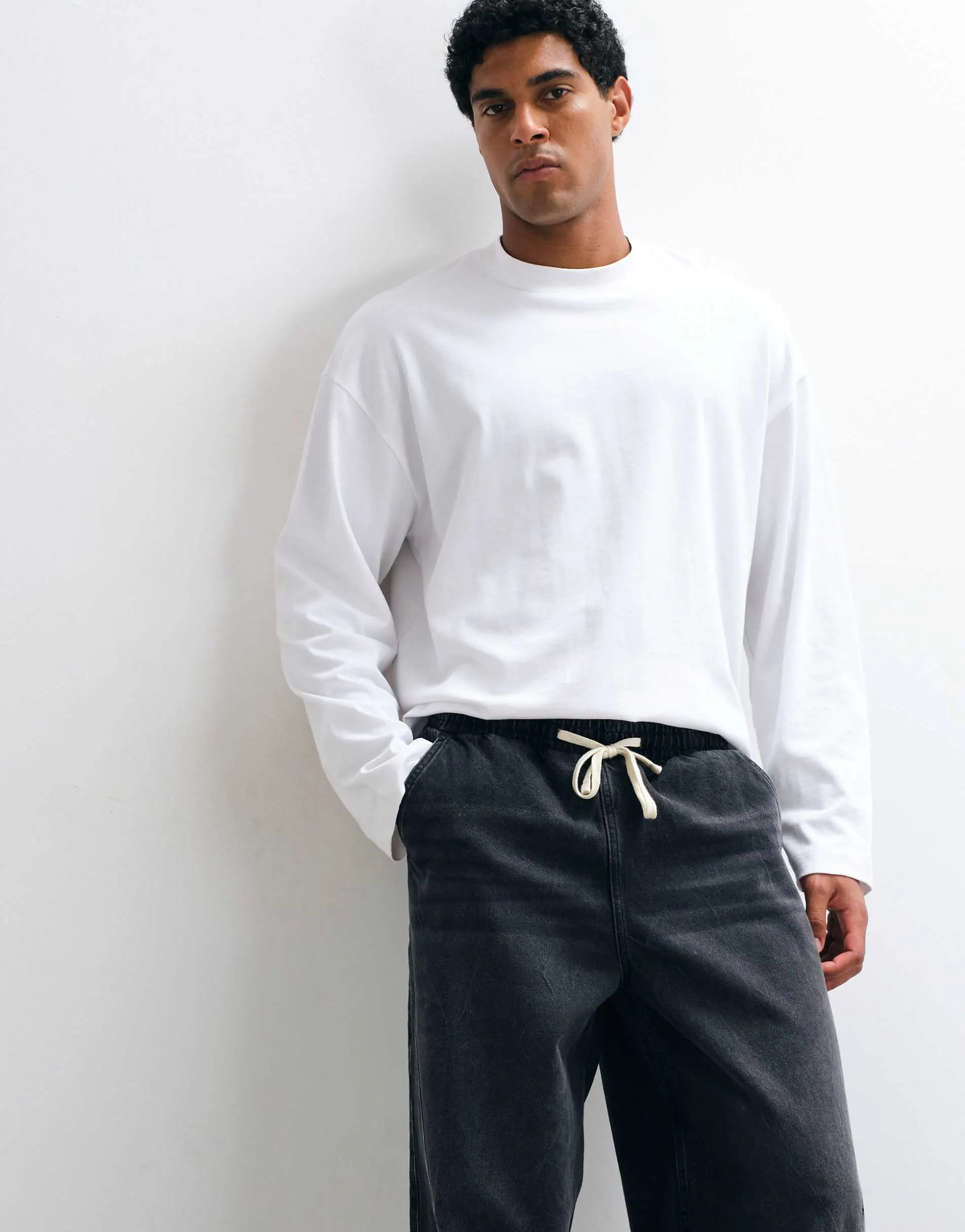 ASOS DESIGN loose jeans in black with tie waist