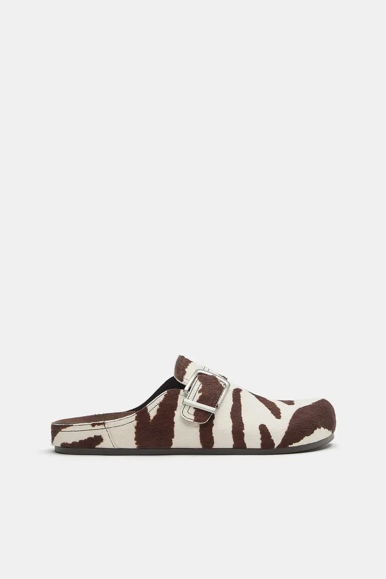 Leather animal print clogs with buckle
