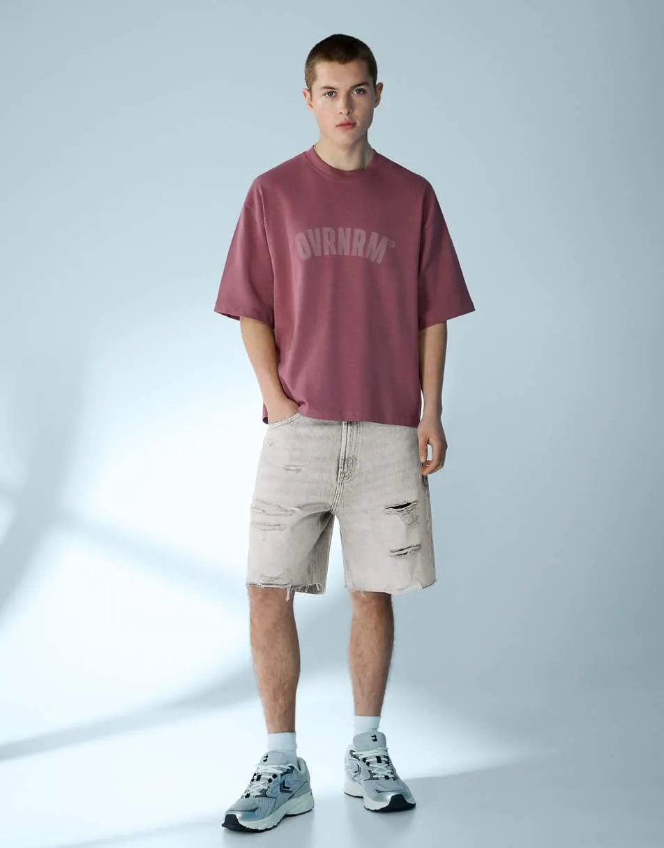 Bershka Ripped denim bermuda shorts in light grey