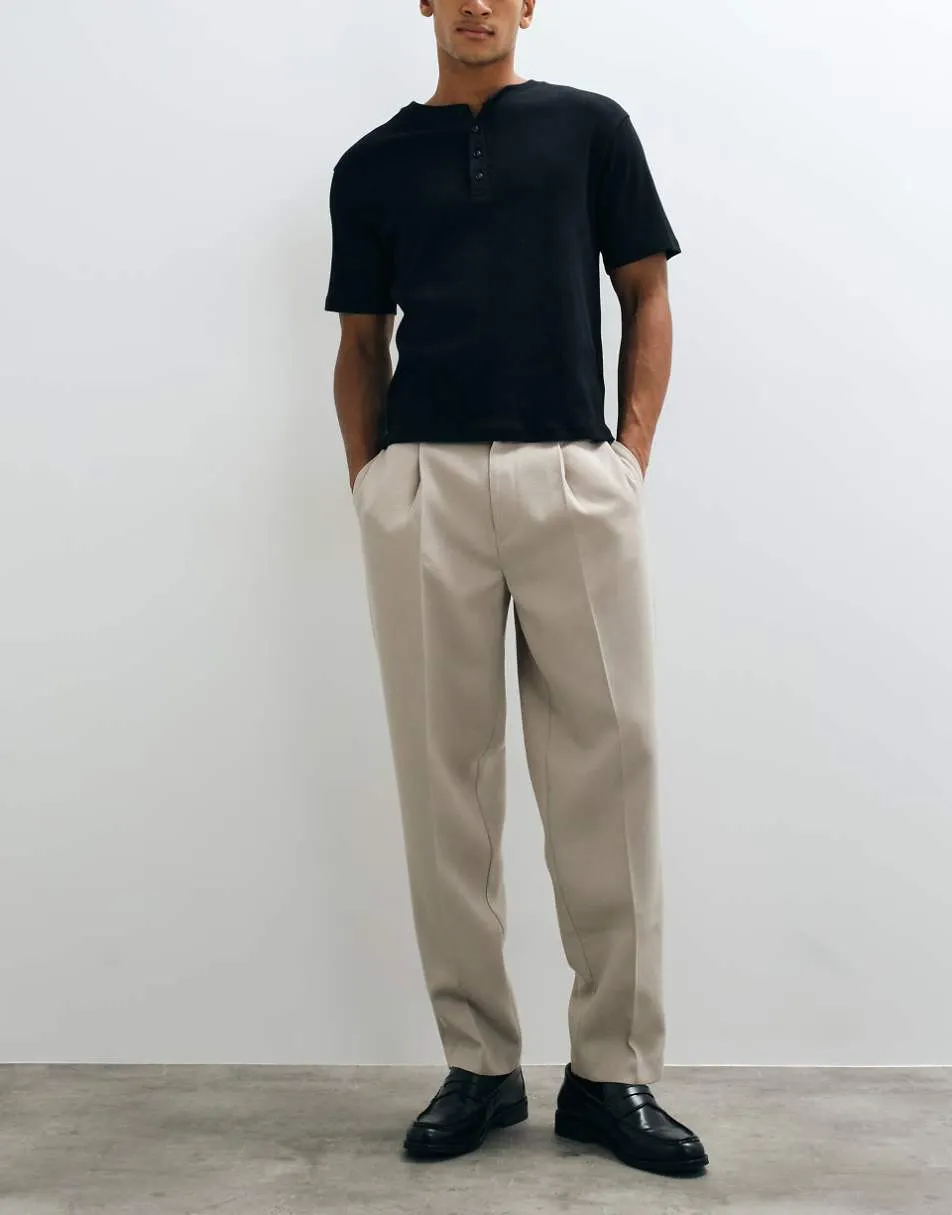ASOS DESIGN tailored pleated oversized tapered trousers in stone microtexture