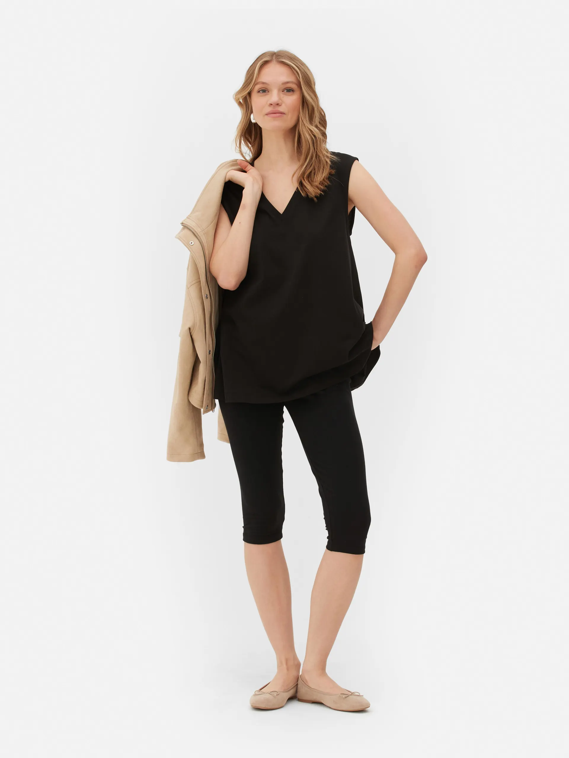 Canotta smanicata con scollo a V