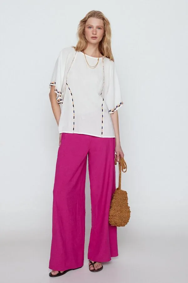 Blusa bordada volante