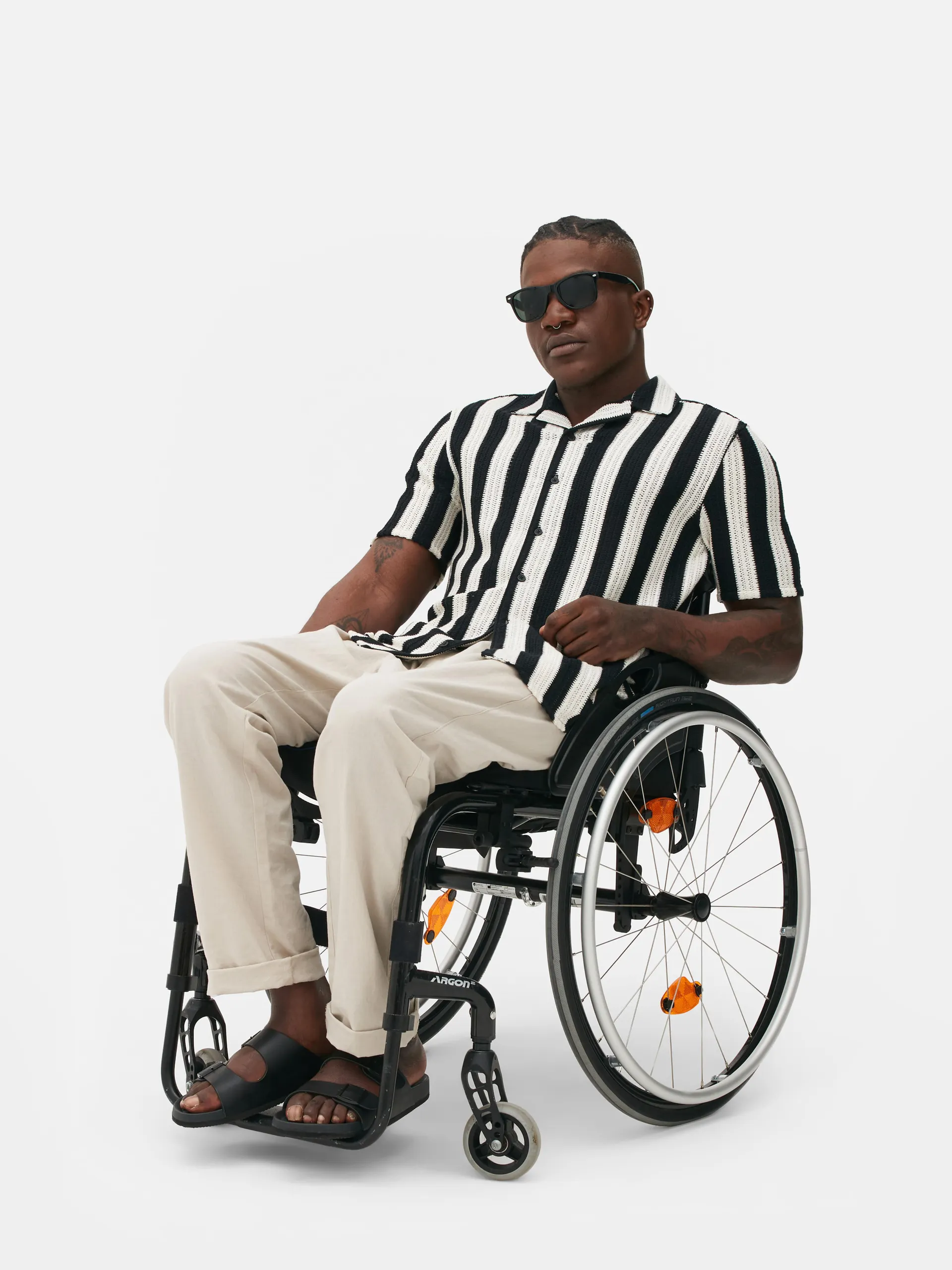 Chemise tricotée à manches courtes et à rayures