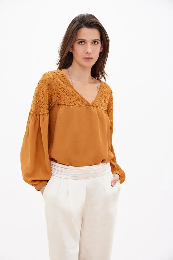 Elizabeth. Blusa con espejos y lazo