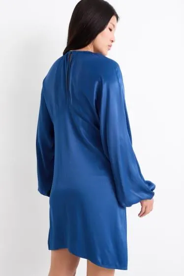 Satin empire dress with balloon sleeves and cut-out