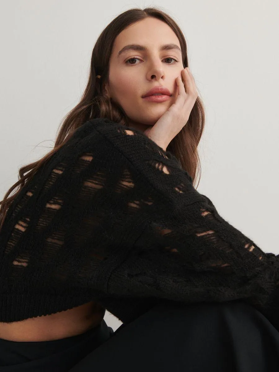 Pulover cu aspect deteriorat