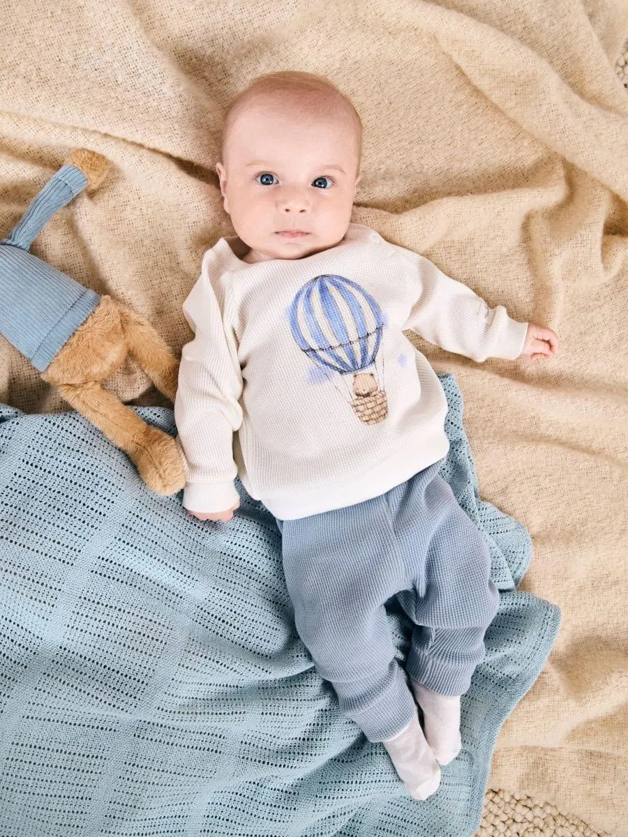 Compleu cu bluză sport și colanți