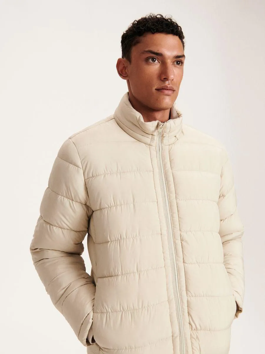 Geacă matlasată cu guler înalt