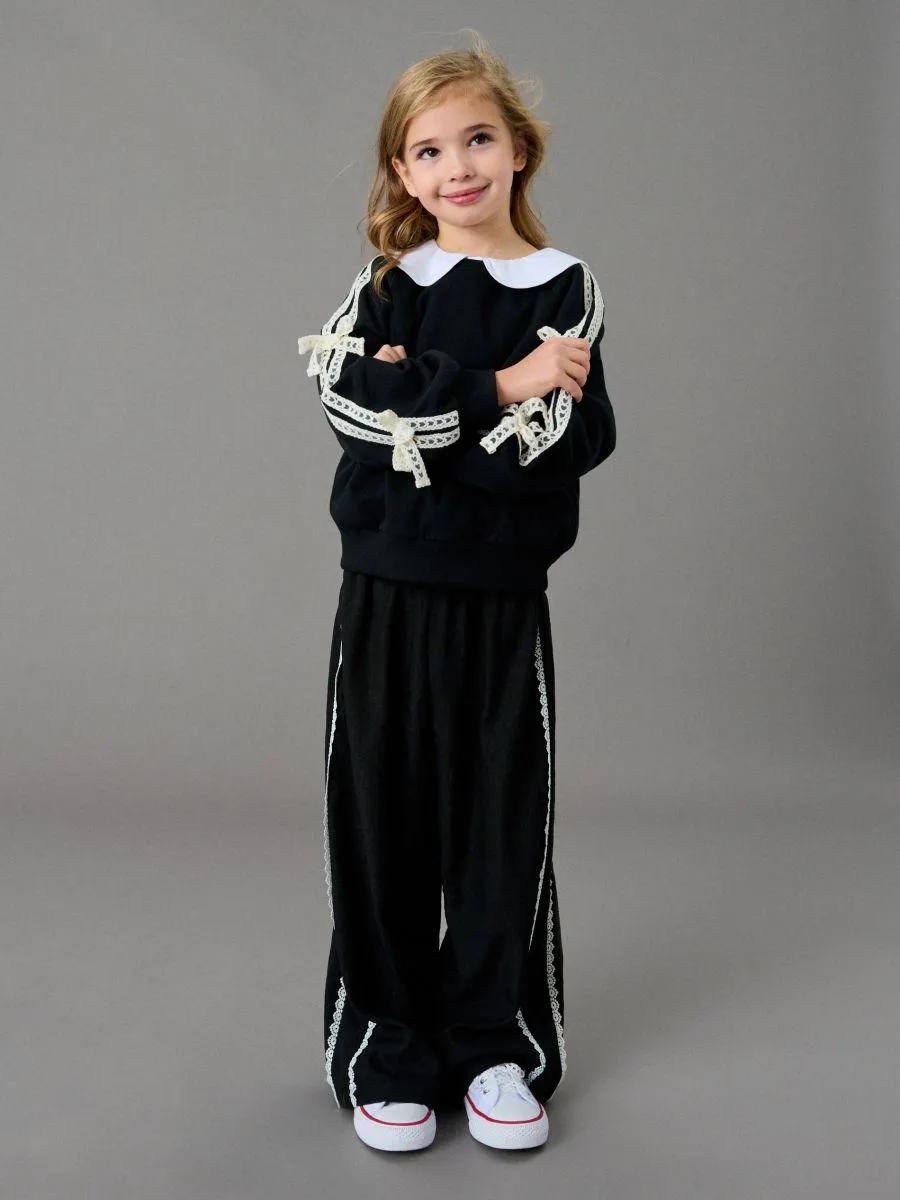 Pantaloni din țesătură cu dantelă decorativă