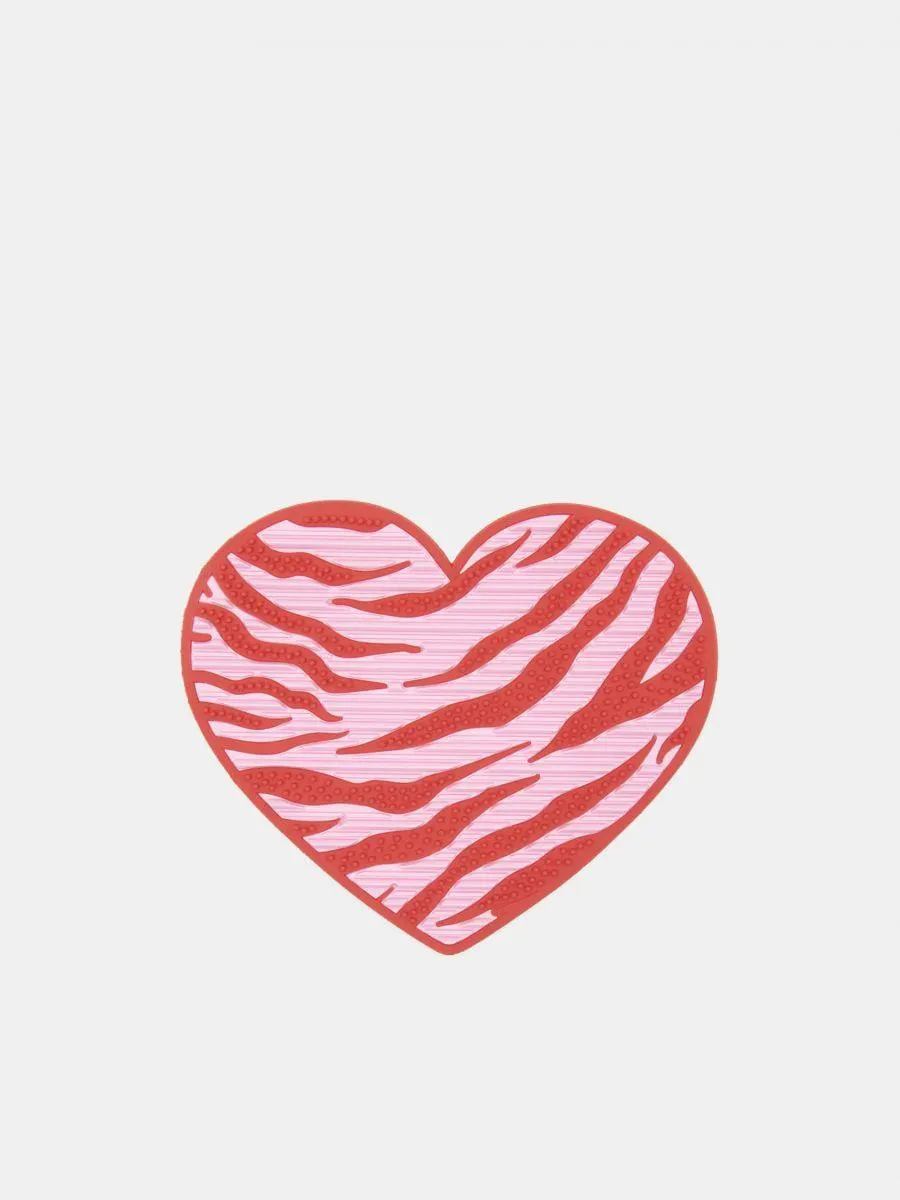 Dispozitiv pentru curățarea pensulelor de machiaj